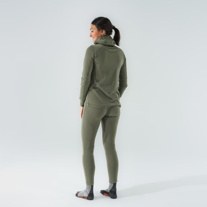 A model wears a fitted olive green base layer set with a high neck and visible flatlock seams.