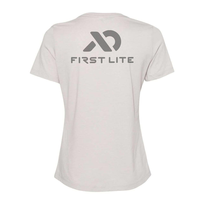 Light grey t-shirt with a dark grey stylized logo and "FIRST LITE" text on the back.